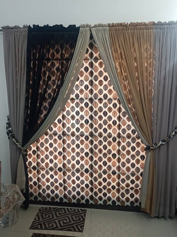 1 blind and 2 chiffon curtains 1