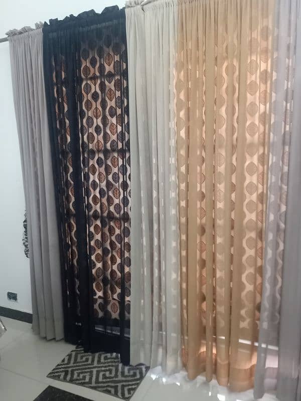 1 blind and 2 chiffon curtains 3