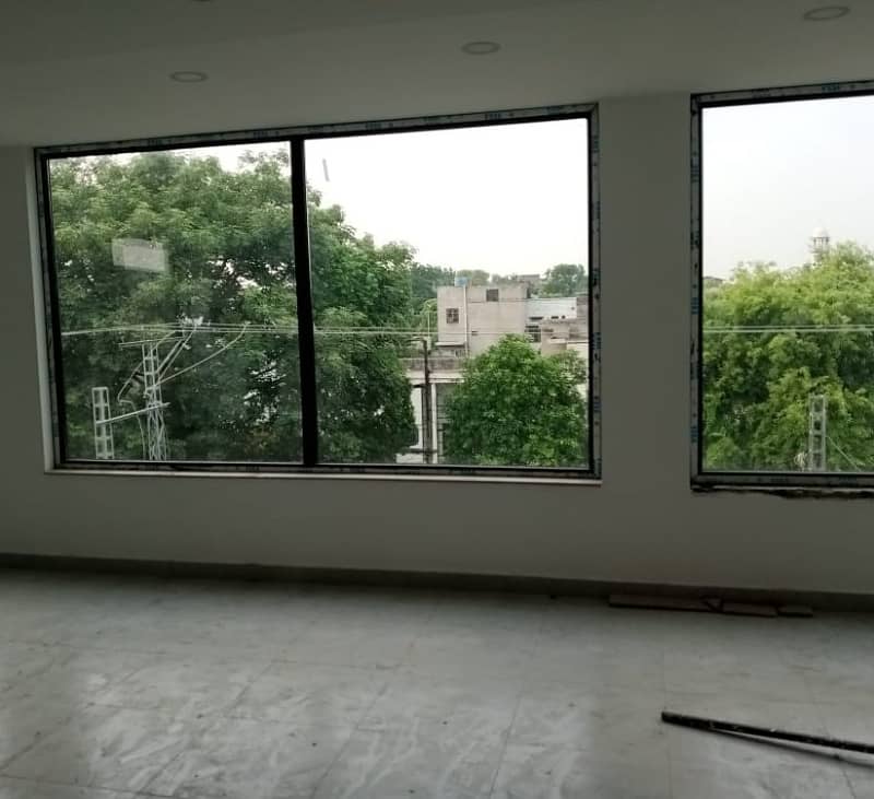 One kanal Brand New Commercial Paid Plaza available for rent in Garden Town Lahore 6