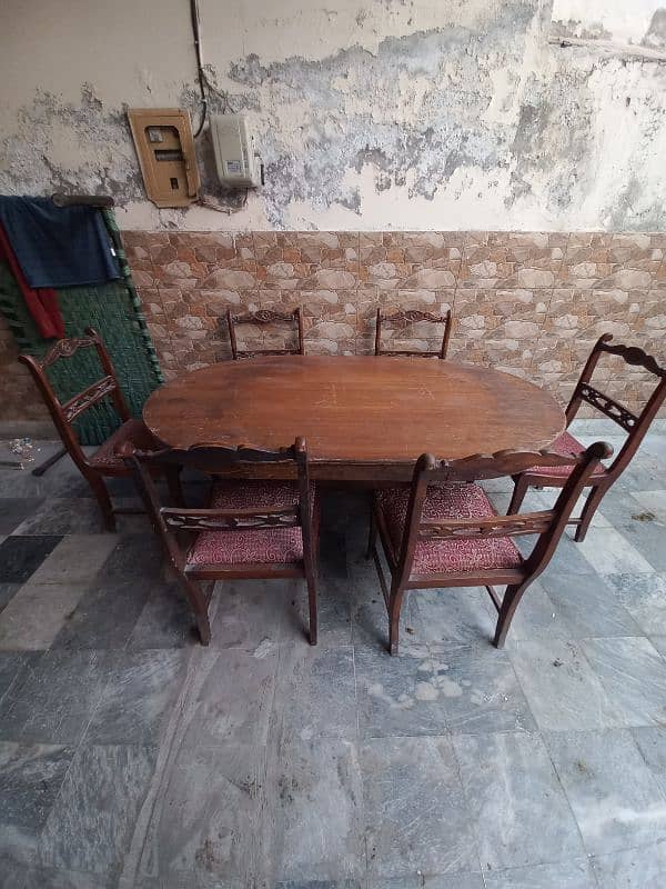 dining table  with 6 chairs made of sheesham wood in good condition 2