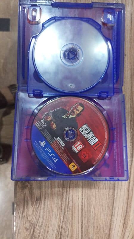 Red dead redemption 2 PS4/PS5 game good condition 9/10 1