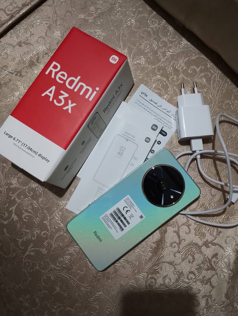 Redmi A3x. . . open box 1