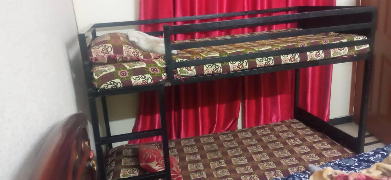 New condition iron double bed . 0