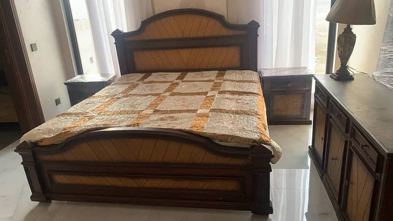 wooden bed with two side tables, mattress and dressing table 0