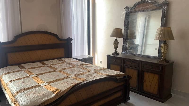 wooden bed with two side tables, mattress and dressing table 2