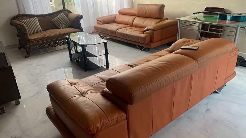 imported , pure leather sofa from China . Two , 3 seatets 3