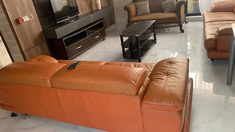 imported , pure leather sofa from China . Two , 3 seatets 5