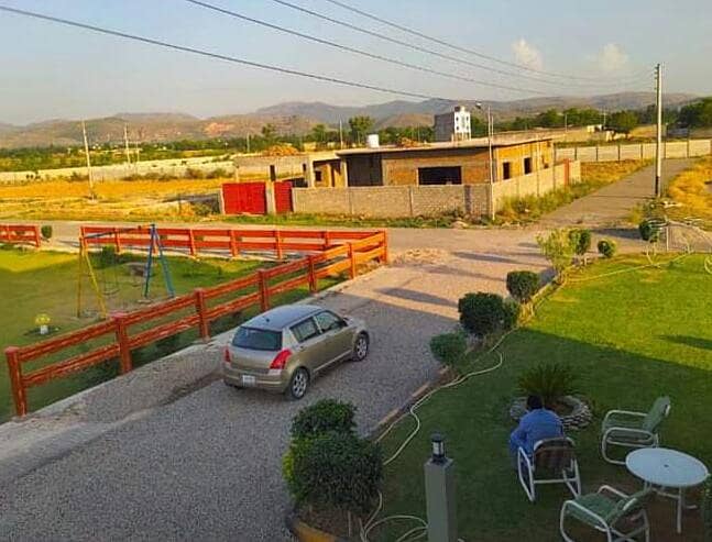 Taxila garden lavel position plot park face for sale 10