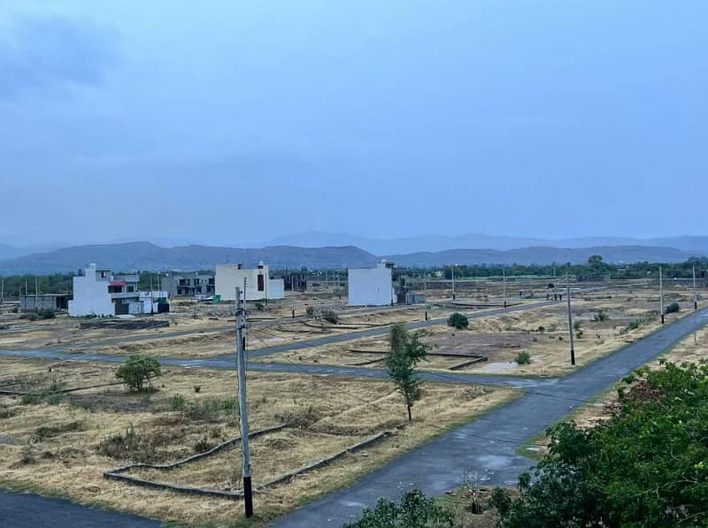 Taxila garden lavel position plot park face for sale 17