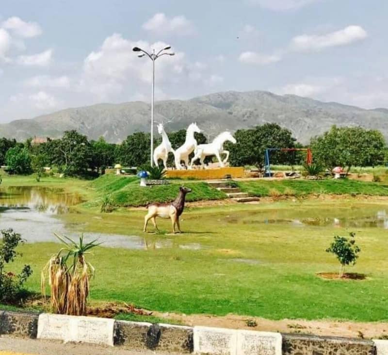 Taxila garden lavel position plot park face for sale 20