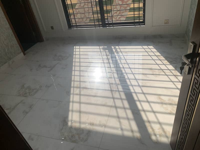 10 MARLA BASEMENT HOUSE ON "50" FEET WIDE ROAD BRAND NEW MINT CONDITION IS AVAILABLE FOR SALE IN DHA PHASE 11 RAHBAR SECTOR 1 10