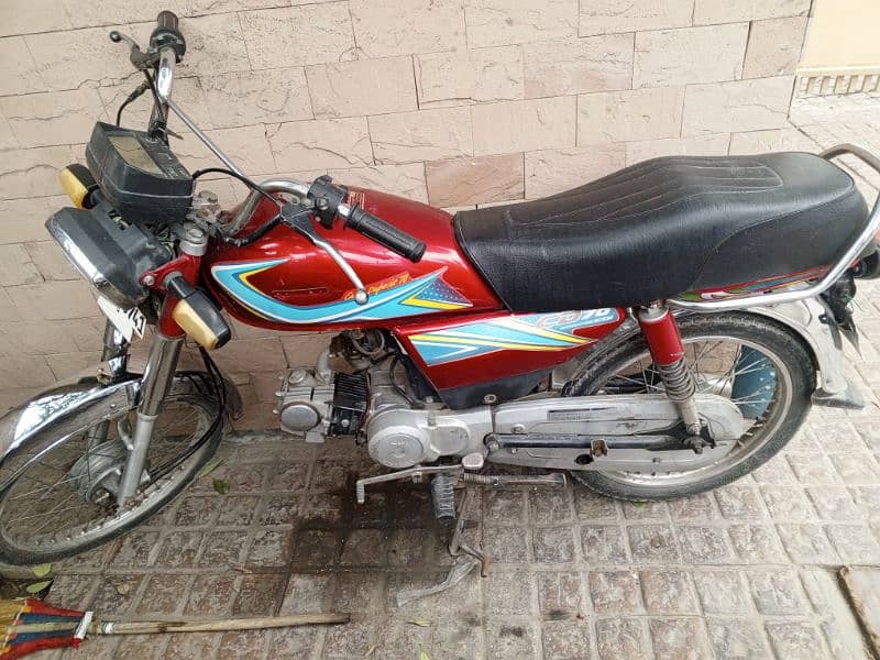 Honda 125 & United Motorcycle CD 70 5