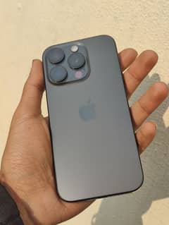 IPhone 15 pro with accessories and AirPods