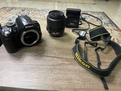 Nikon D3000 + 18-55mm Lens + charger + Bag