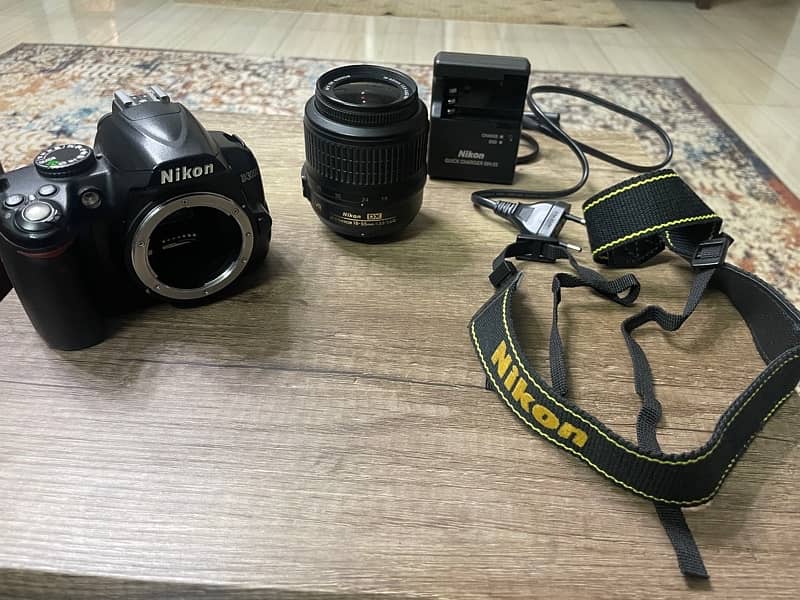 Nikon D3000 + 18-55mm Lens + charger + Bag 2