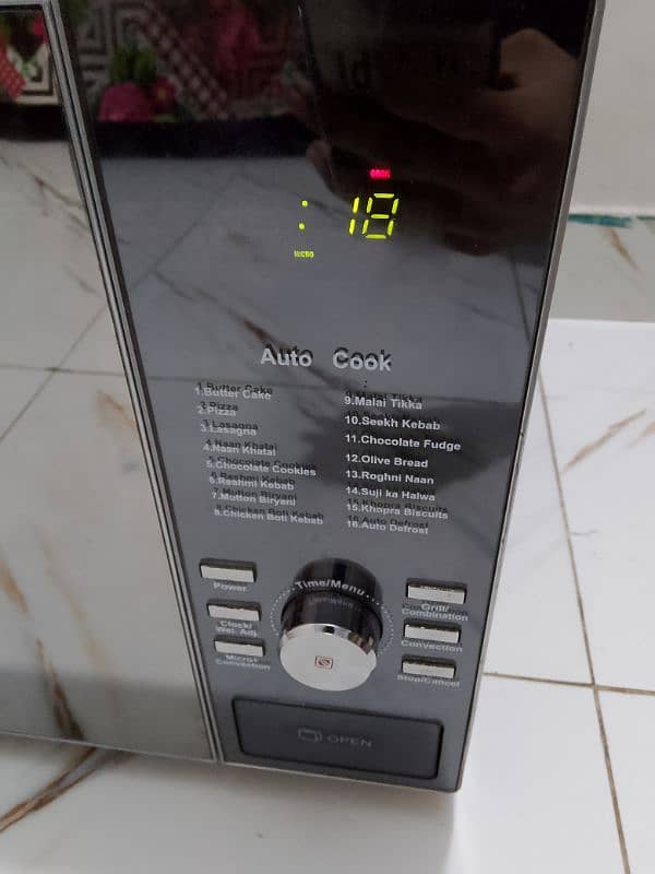 Dawlance 3 in 1 steel body microwave oven 3 days checking warranty 4