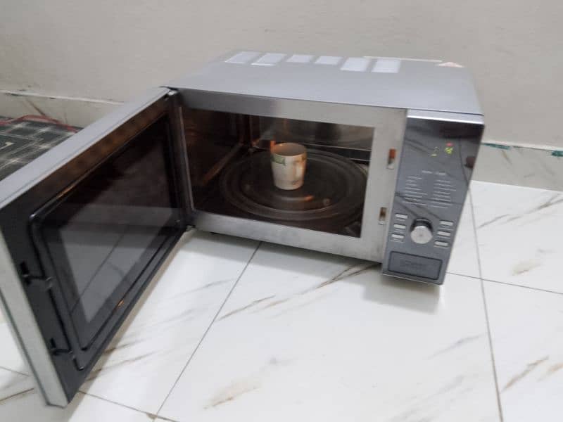 Dawlance 3 in 1 steel body microwave oven 3 days checking warranty 9