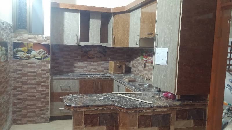 two bed dd portion for rent in johar 0