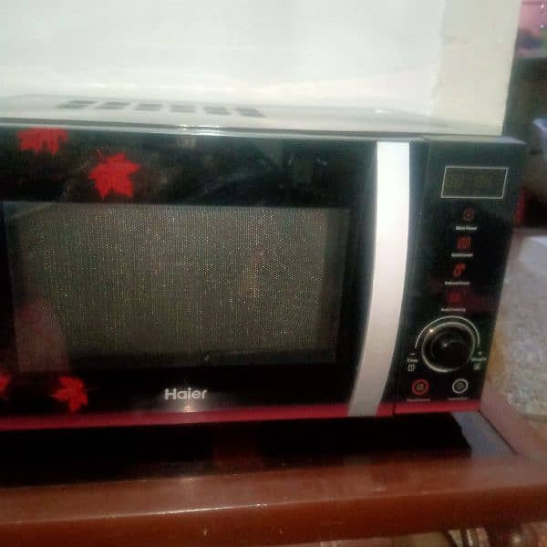 microwave n grill oven  25liter  in lush condition 0