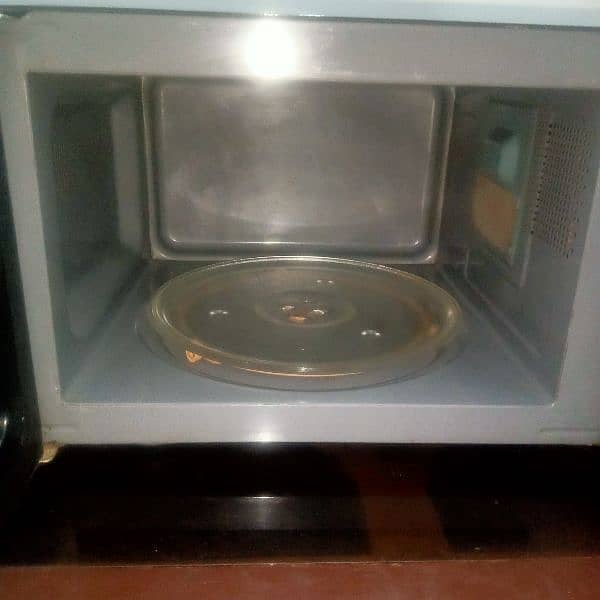 microwave n grill oven  25liter  in lush condition 1