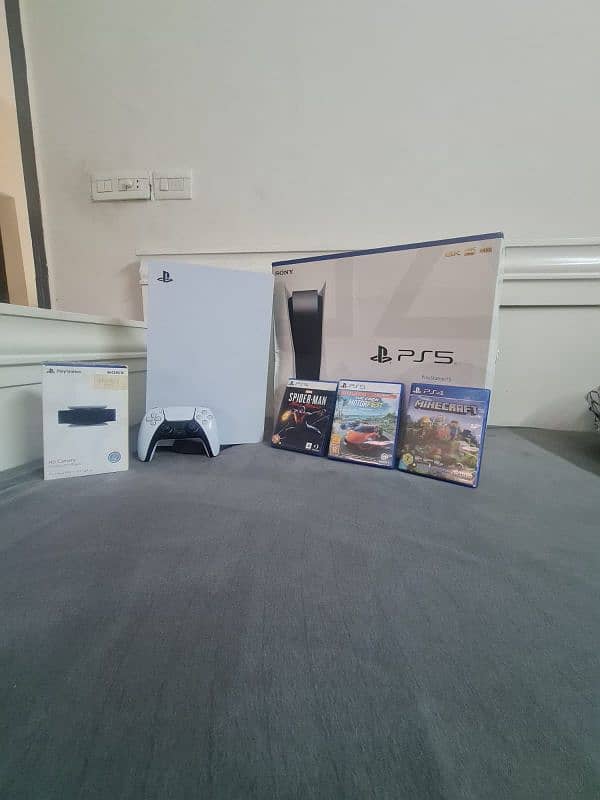 ORIGINAL PS5 WITH BOX,CONTROLLER,2 PS5 GAMES,1 PS4 GAME AND PS5 CAMERA 0