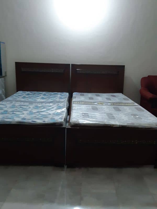 two single beds with matrices 2