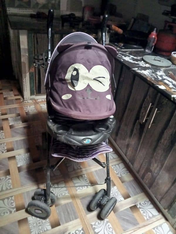 kids pram in good condition 0