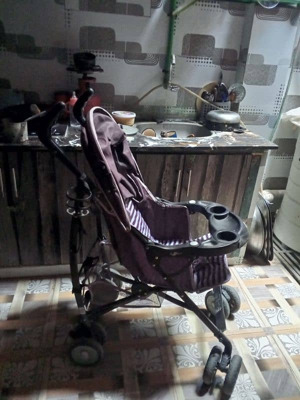 kids pram in good condition 1