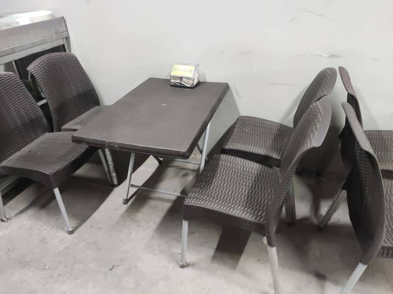 Plastic Chairs And Table 1