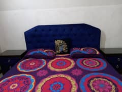 King size bed with two side table and mattress with matching bedsheet