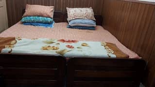 single wooden bed