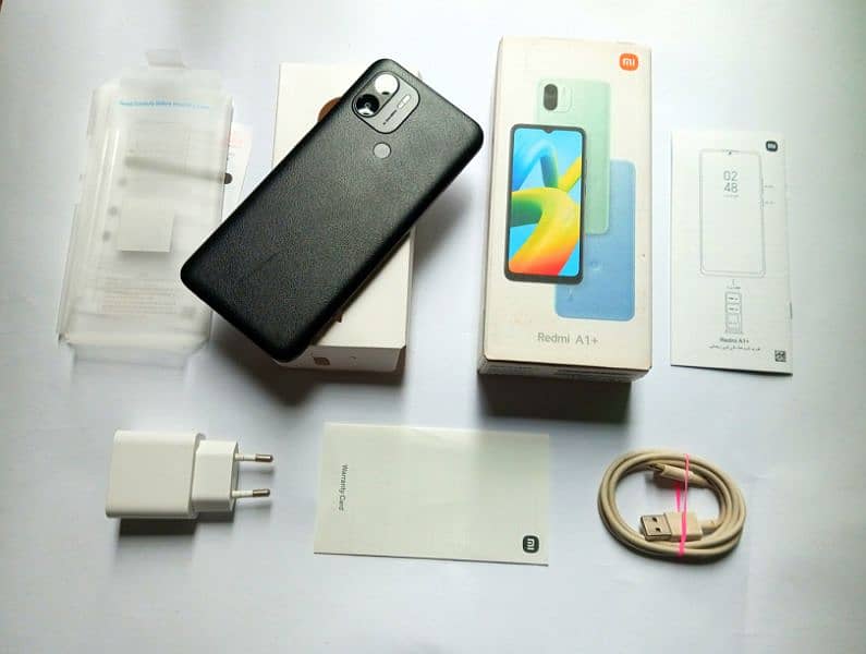 REDMI A1 PLUS WITH BOX & CHARGER 2