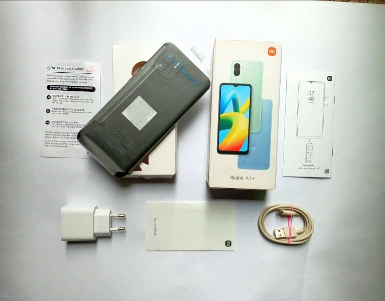 REDMI A1 PLUS WITH BOX & CHARGER 1