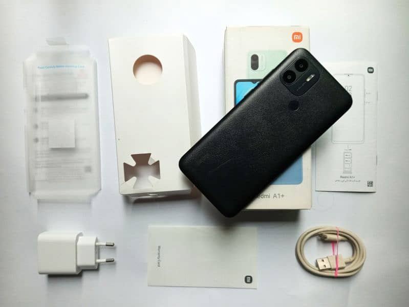 REDMI A1 PLUS WITH BOX & CHARGER 6