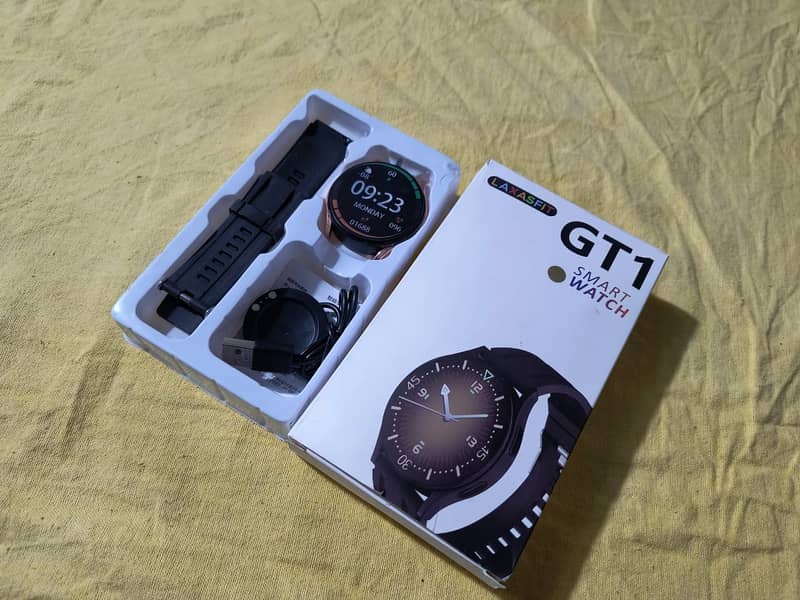 Smart Watch ; Band ; Charging Cable and User Manual 1