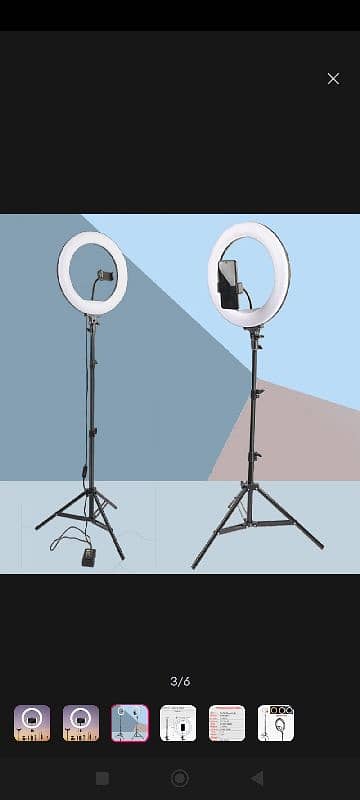 ring light with a tripod stand. 1