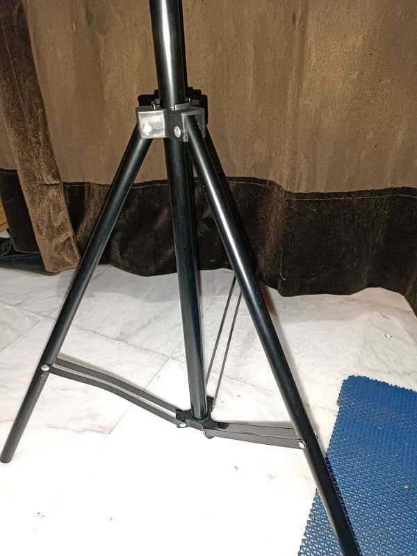 ring light with a tripod stand. 5