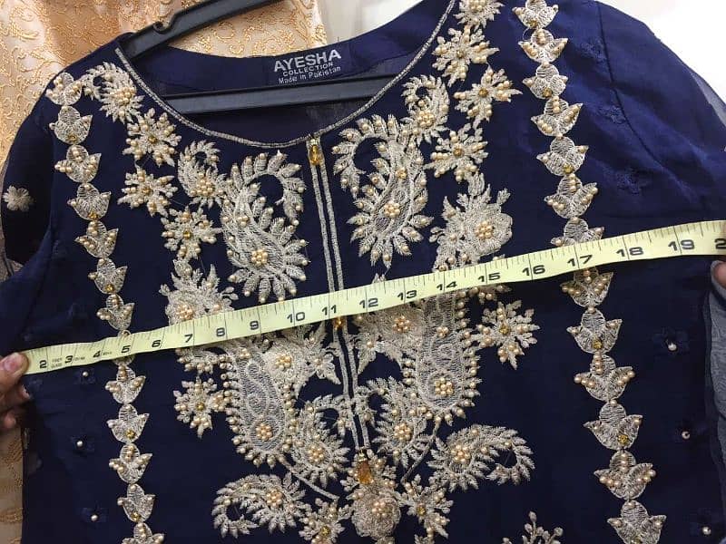 price 2999. three peice embroided shalwar kameez dress , royal blue 8