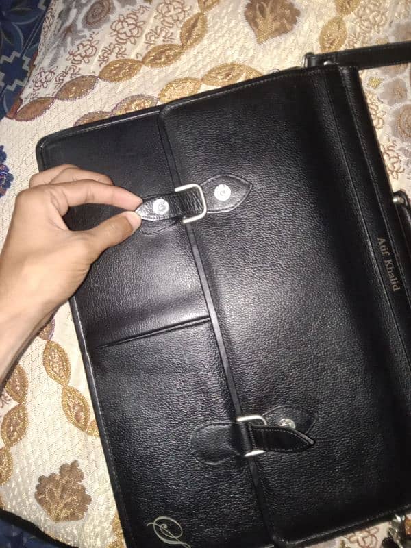 original leather black laptop bag 10 by 10 condition 1