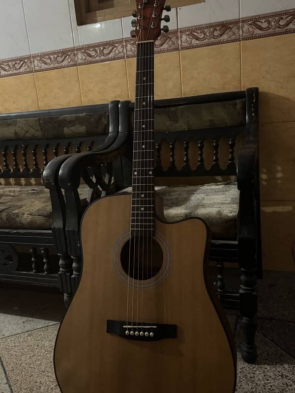 acoustic guitar  with the beautiful color and sounds professional 1