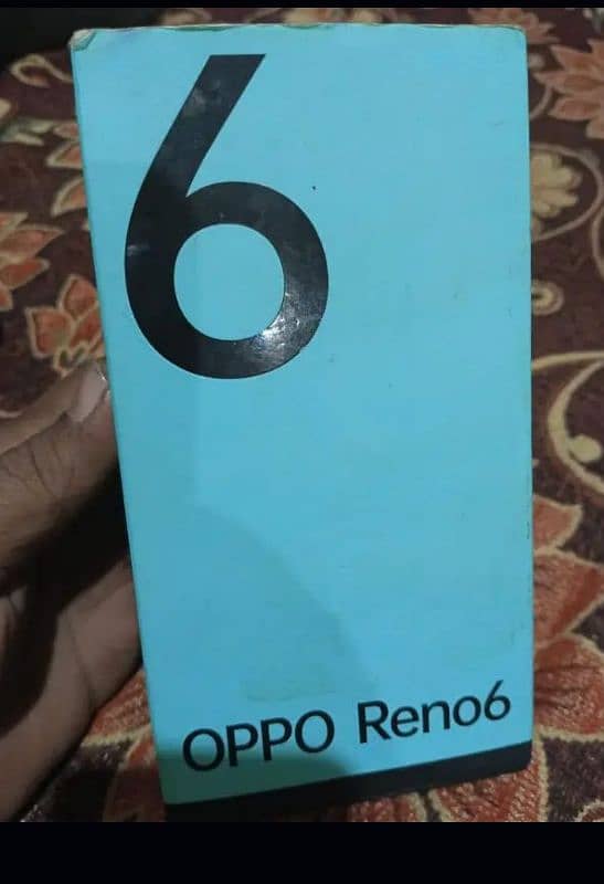 oppo Reno 6. with box I'm selling rem 8 memory 128 0