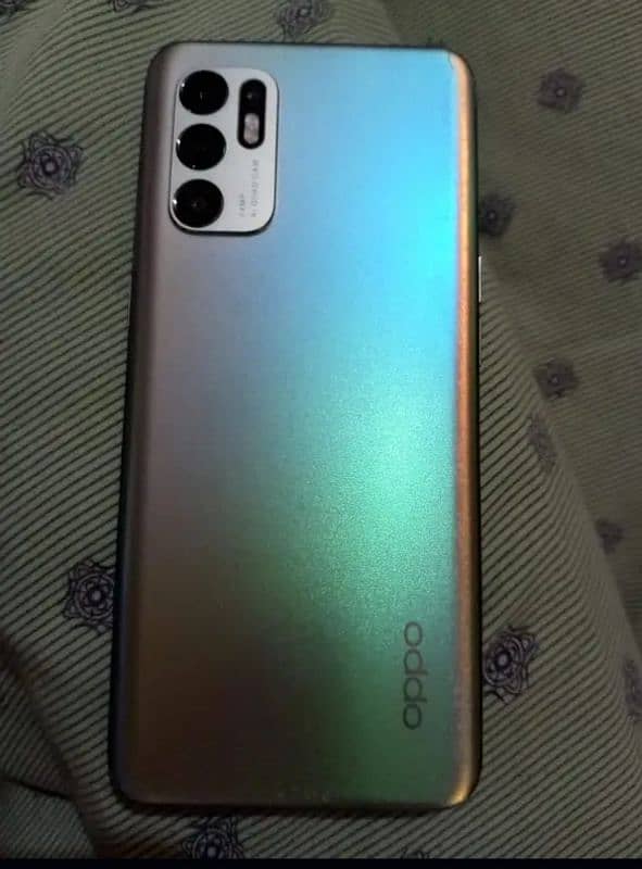 oppo Reno 6. with box I'm selling rem 8 memory 128 2