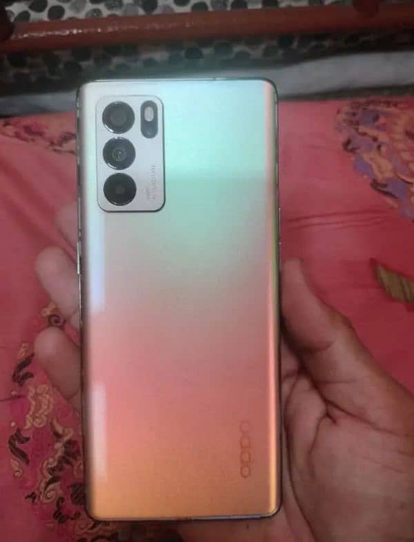 oppo Reno 6. with box I'm selling rem 8 memory 128 3