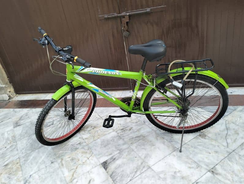 Used bicycle local with gears 3