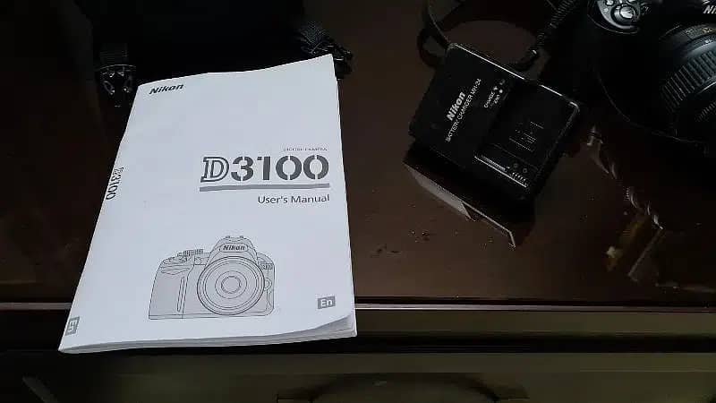 Nikon D3100 Excellent condition With Genuine Lens & Charger 2