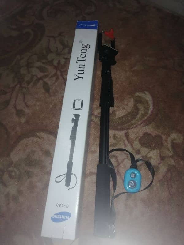 2 selfie stick in one price 3