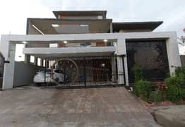 D-12 / 4 brand new house one kanal 9 bed house available