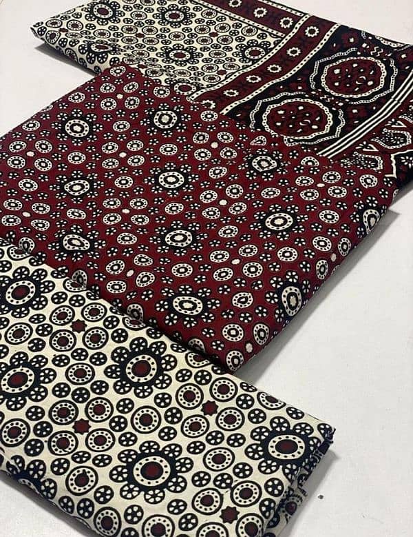 3 Pcs WomenUnstitched Cotton Ajrak  Suit 0