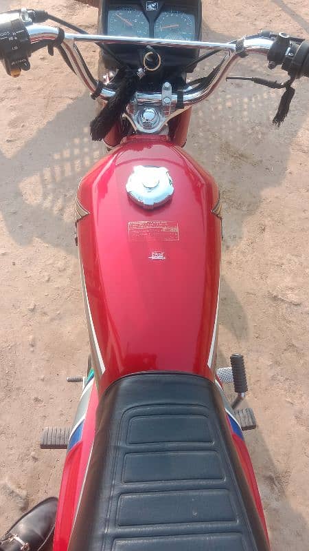 Honda 125 2023 model neet and clean condition Islamabad number 3 digit 0