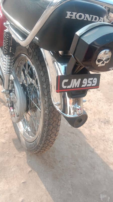 Honda 125 2023 model neet and clean condition Islamabad number 3 digit 3